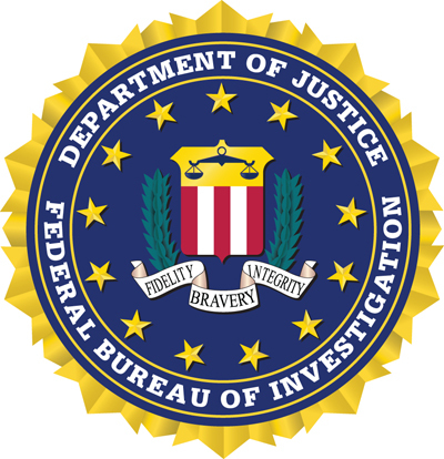 A Hampton Police officer is charged with tampering with a FBI witness. (Courtesy FBI)