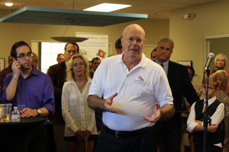John Sullivan, co-owner of American Eagle Flag & Flagpole, LLC, talks about how Launchpad helped him have a "soft landing" when he relocated to Williamsburg during the grand opening of the business incubator's location in New Town Sept. 18, 2015. (Kirsten Petersen/ WYDaily)