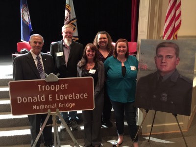 (Far left) Retired VA State Police Colonel Bill Corvello with (l to r) Trooper Lovelace’s son, daughter, granddaughter and niece. (Photo courtesy Virginia State Police)