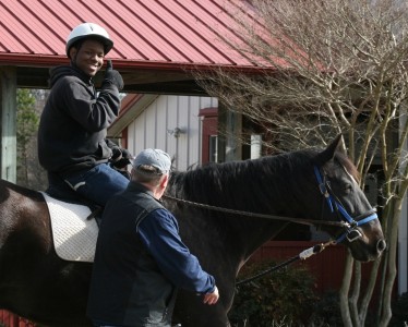 A Dream Catchers client participates in a riding lesson. (Photo courtesy of Dream Catchers)