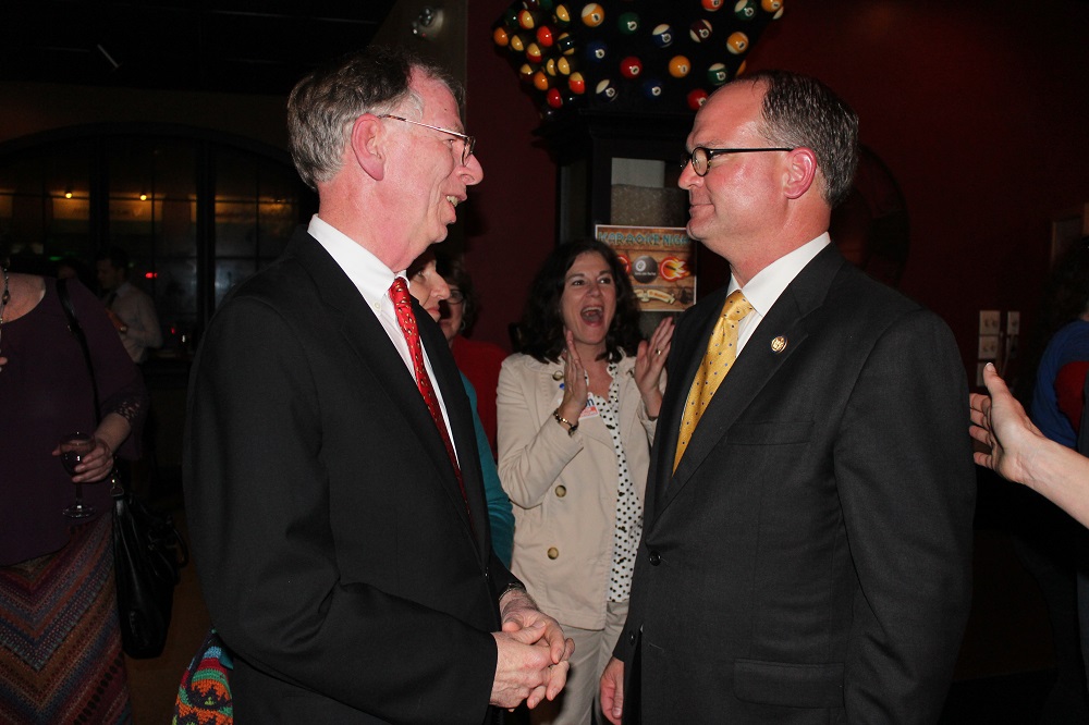John McGlennon (left) is congratulated by Del. Monty Mason for his victory to maintain the Robert District seat on the James City County Board of Supervisors. (Ty Hodges/WYDaily)