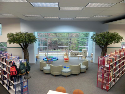 Two new tree sculptures were recently installed in the play area at the James City County Library. (Courtesy WRL)