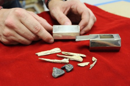 The real reliquary next to a plastic model, complete with models of the ampulla pieces and bone fragments, produced by Micro Photonics. (Elizabeth Hornsby/WYDaily)
