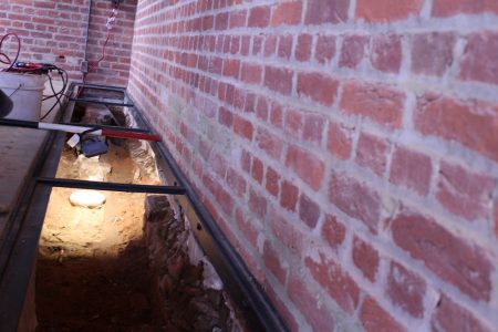 The trench that runs along the northern wall reveals the foundation of a 17th-century church. (Andrew Harris/WYDaily)