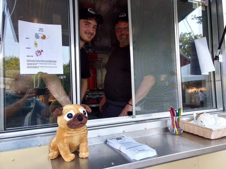 Sam (left) and Scott Coelln opened their The Hungry Pug food truck Monday. (Andrew Harris/WYDaily)