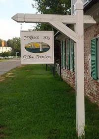 Family friend Bucky Burruss gifted the Gucanacs with this hand-painted sign depicting the New Point Comfort Lighthouse located on the northern side of the entrance to Mobjack Bay.