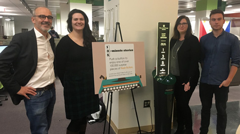 Short Edition Business Development Manager Christophe Sibieude (far left) and CEO Loci Giraut (far right) celebrate the installation with Elizabeth Merrifield and Lisa Nickel of W&M Libraries. (WYDaily/Courtesy W&M Libaries)