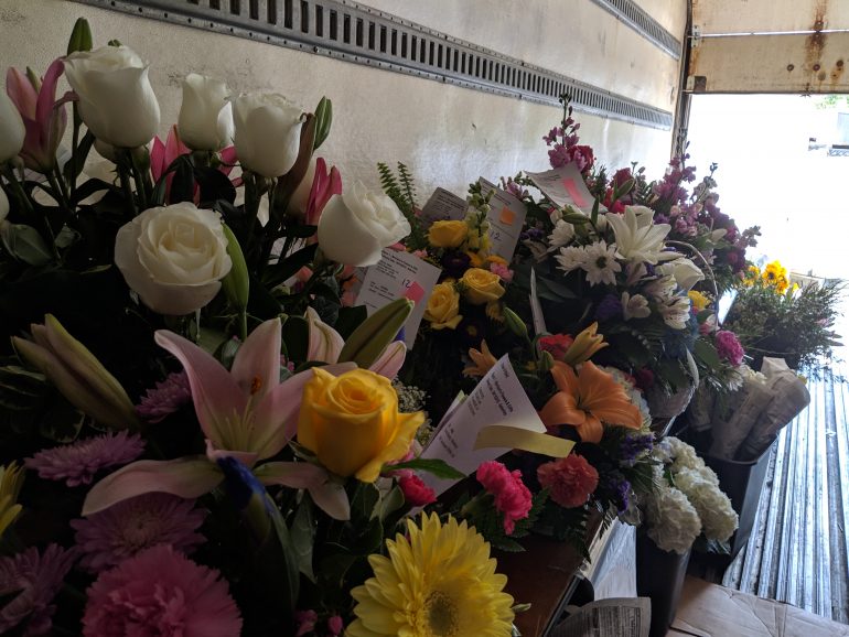 Flower arrangement orders for Mother's Day are stored in a large semi-trailer behind Morrison's Flowers and Gifts on Jamestown Road. (WYDaily/Sarah Fearing)