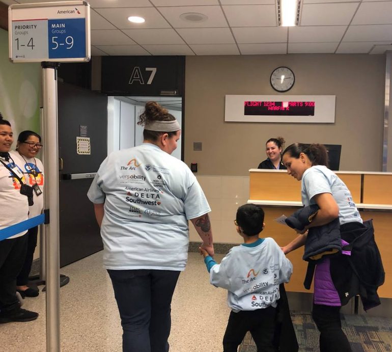 A family boards a plane during The ARC's 2019 Wings for All program at Norfolk International Airport. (WYDaily/Courtesy VersAbility Resources)