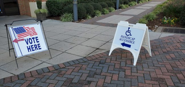 Election Day is Tuesday. Do you know what to expect at the Historic Triangle polling stations? Above: Vote here sign outside of the City Center satellite polling station in Newport News on Friday, Oct. 30. (WYDaily/ Julia Marsigliano)
